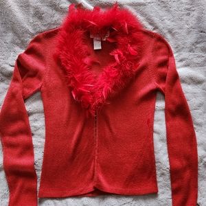 Joseph A.  Red sweater.